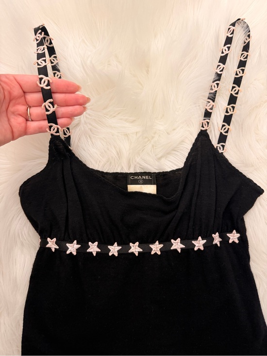 CHANEL Tops - Rare Vintage Chanel Star top 2005 🖤
